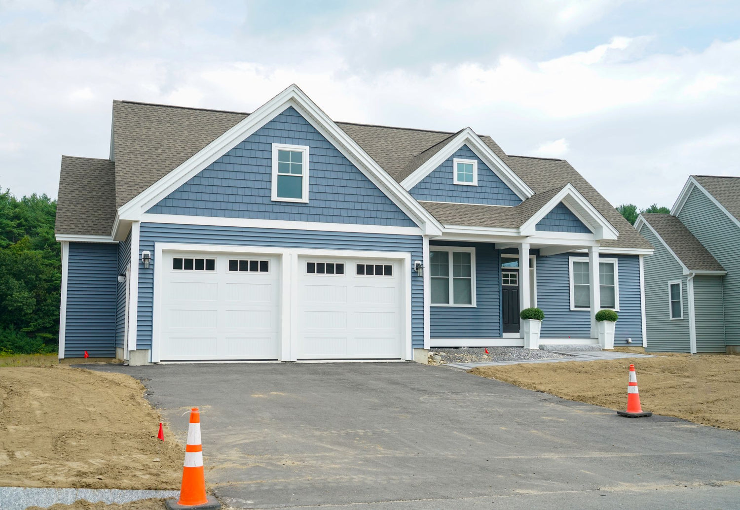 Newly built home with bare dirt yard awaiting grass seed, the ideal use case for Lifetyme Pro Turf EZ Sod fast-germinating lawn seed